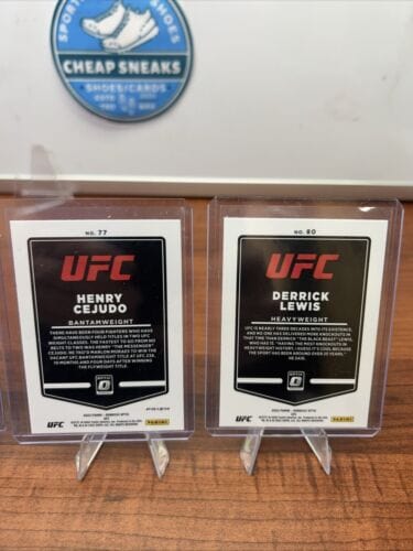 2022 Panini Donruss Optic UFC Blue Prizm Henry Cejudo, Derrick Lewis,