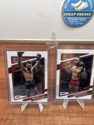 2022 Panini Donruss Optic UFC Blue Prizm Henry Cejudo, Derrick Lewis,