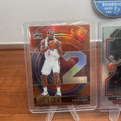 2021-22 Panini Select - Select Numbers Kawhi Leonard #3 Silver Prizm